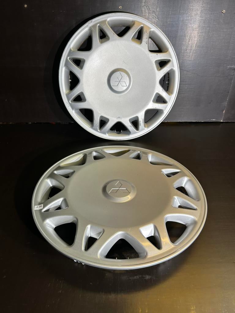 2 enjoliveurs Mitsubishi galant carisma 14", Enlèvement ou Envoi, Comme neuf