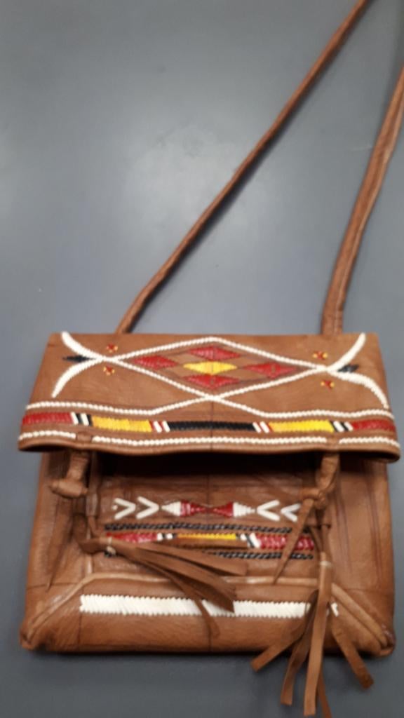 leder handtasje, Ophalen, Gebruikt