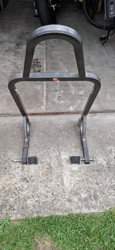 Paddockstand motor achter, Ophalen