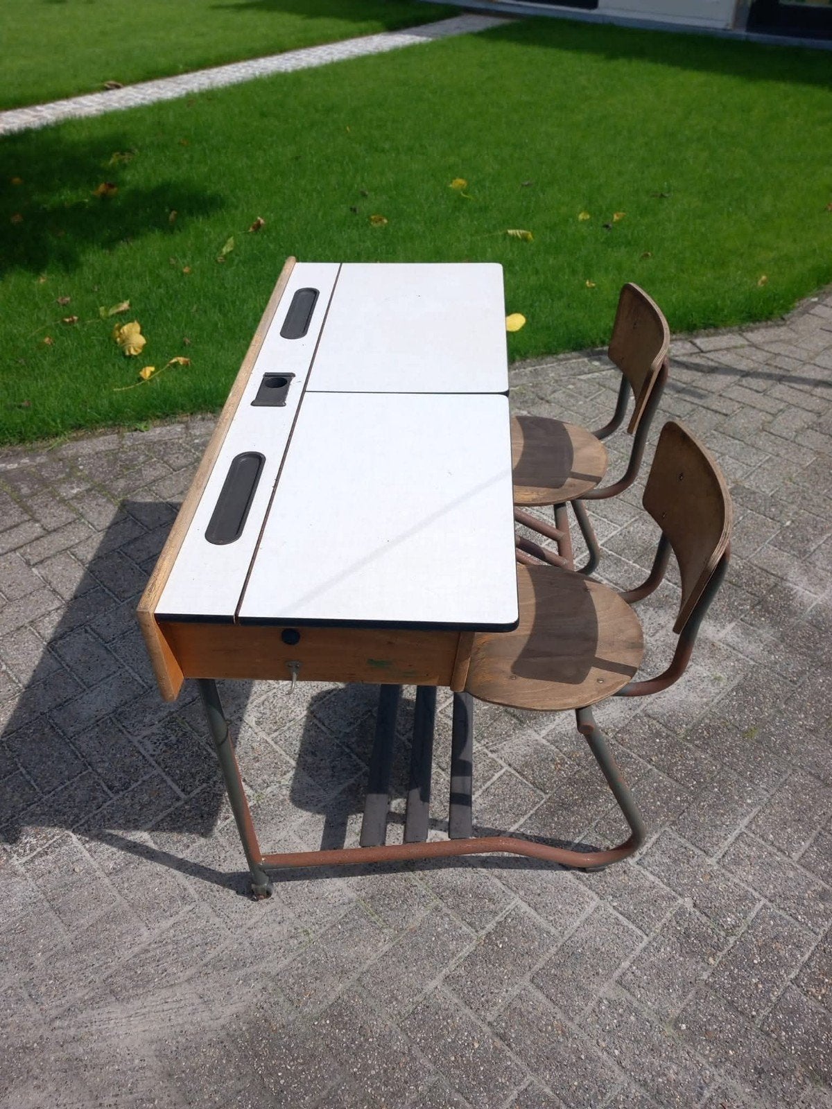 retro schoolbank, Ophalen