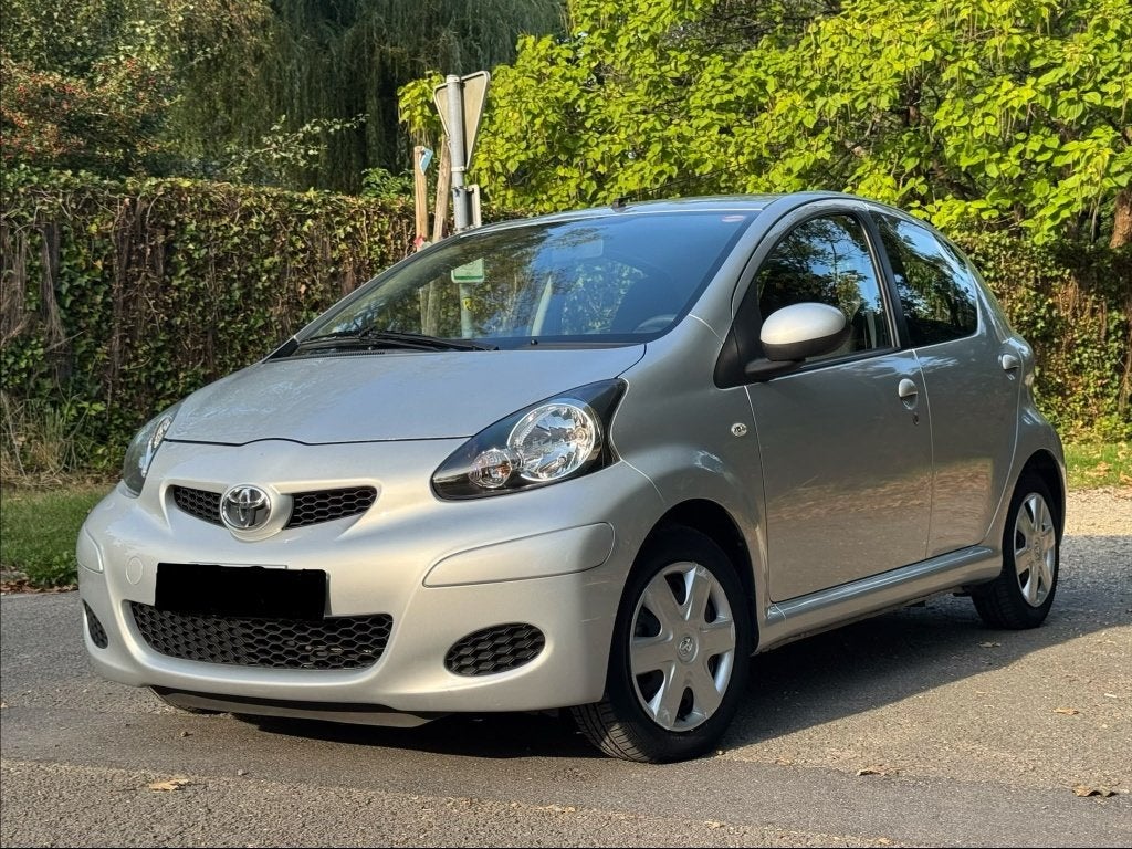 Toyota Aygo Essence 5 Portes • 49.030 km • Garantie 12 mois, Auto's, Toyota, Voorwielaandrijving, Euro 5, Stof, 50 kW
