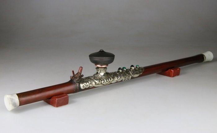 pipe à opium, Enlèvement ou Envoi