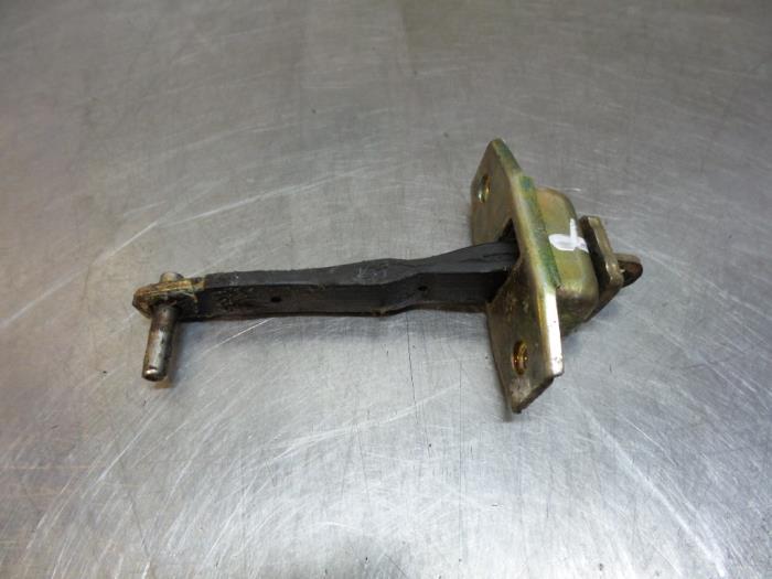 Butée 2portes droite d'un Toyota Starlet (Starlet 95-), -, Toyota, Utilisé, -