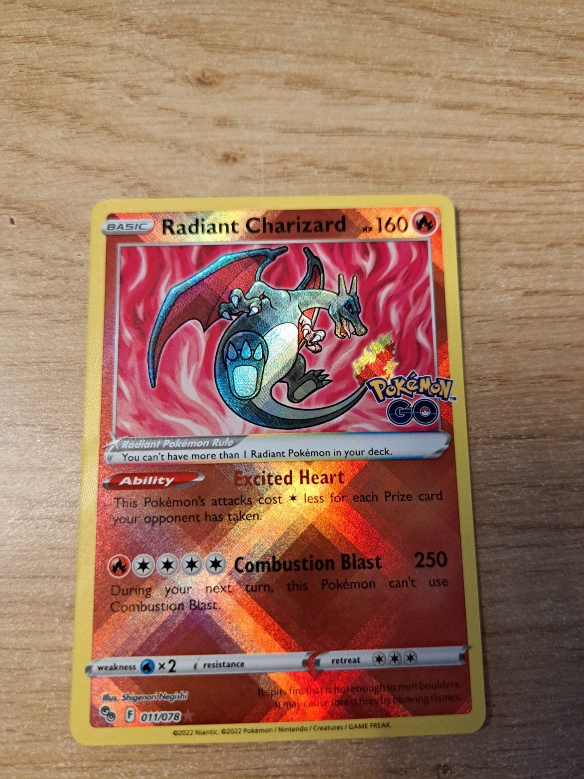 Radiant charizard 011/078, Ophalen