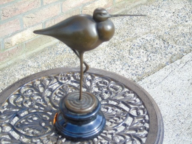 een vogel met een lange snavel in brons gesigneerd. JUNO., Ophalen of Verzenden, Brons