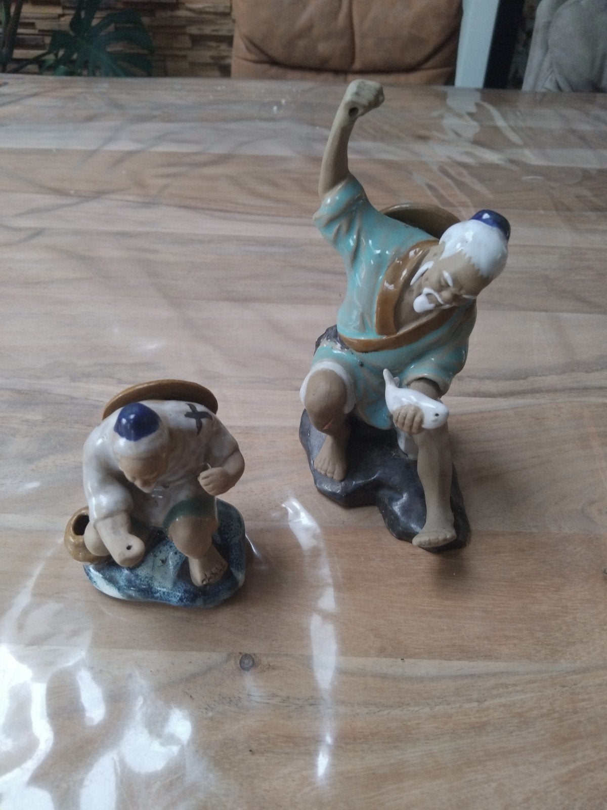 Shiwan mudman beeldjes, Ophalen