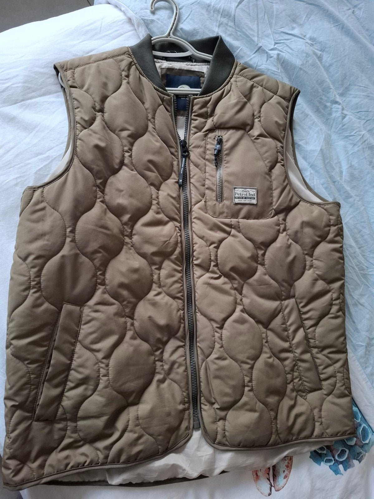 Petrol bodywarmer voor de zomer..., Enlèvement