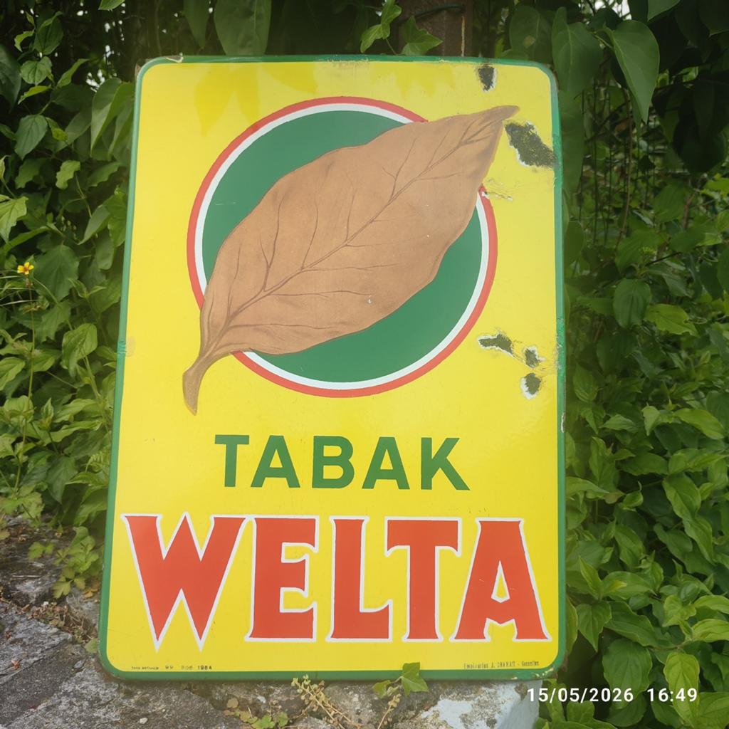 Vieille plaque en email TABAK WELTA de 1954 ., Enlèvement, Utilisé, Panneau publicitaire