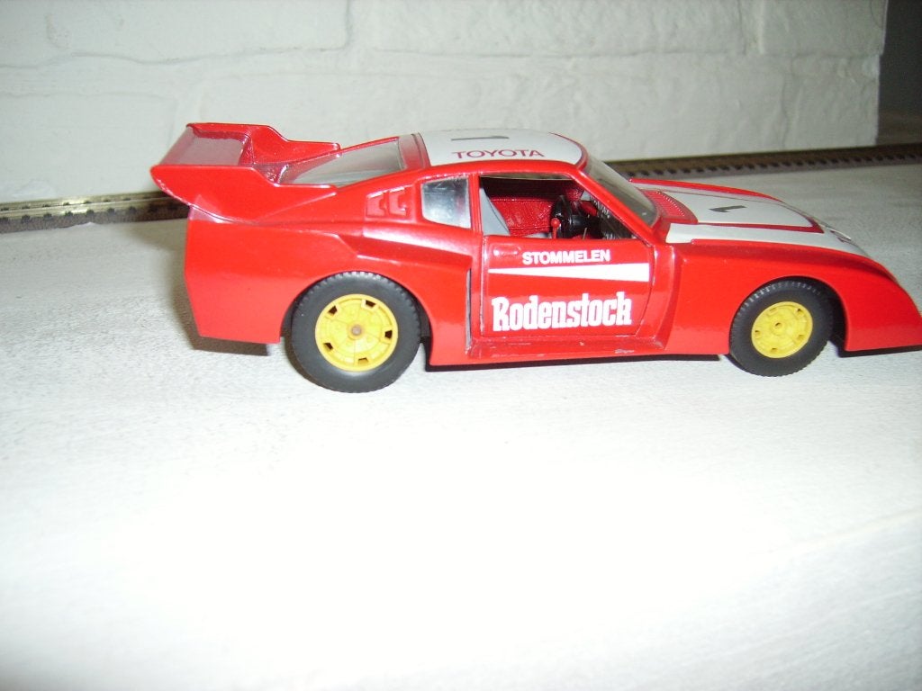 BURAGO TOYOTA CELIC LIFTBACK « RODENSTOCK » 1/24, Hobby & Loisirs créatifs, Voitures miniatures | 1:24, Enlèvement ou Envoi, Comme neuf