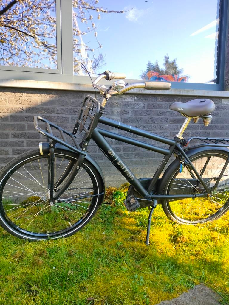 Jongensfiets van het Merk Cortina, Ophalen