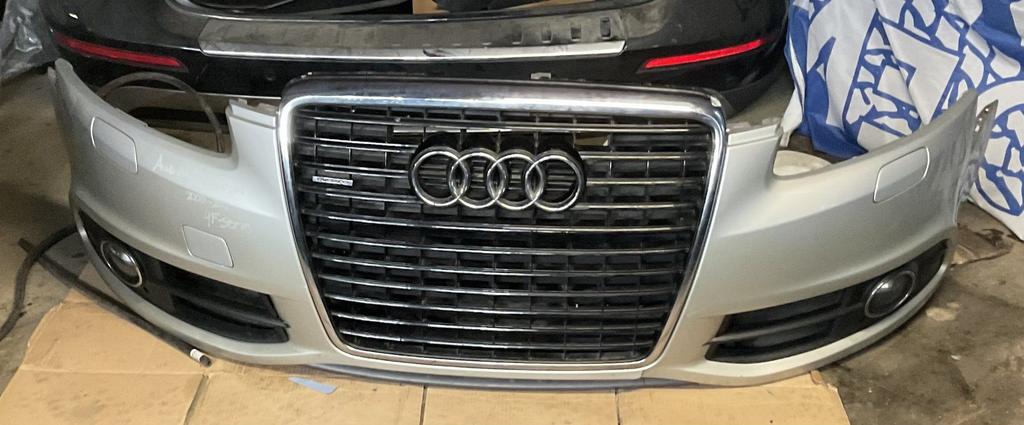 Audi A6/S6/Allroad 4F-serie Voorbumper met grill en mistlamp, -, Origine de la pièce connue, Utilisé, -