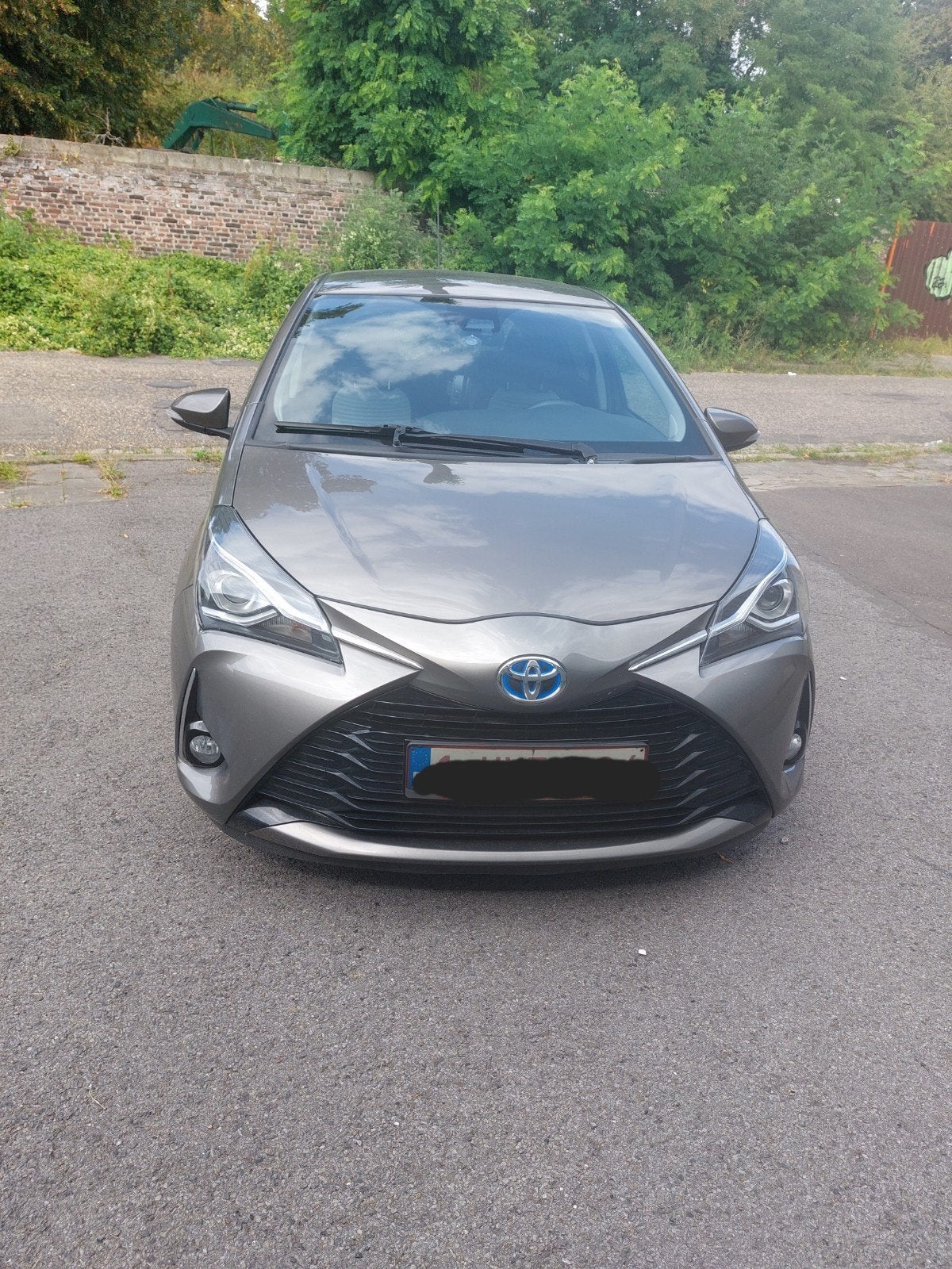 toyota yaris 1,5 l automatique hybride grise 2019 102.916 km, Autos, Argent ou Gris, Achat, Euro 6, Entretenue par le concessionnaire