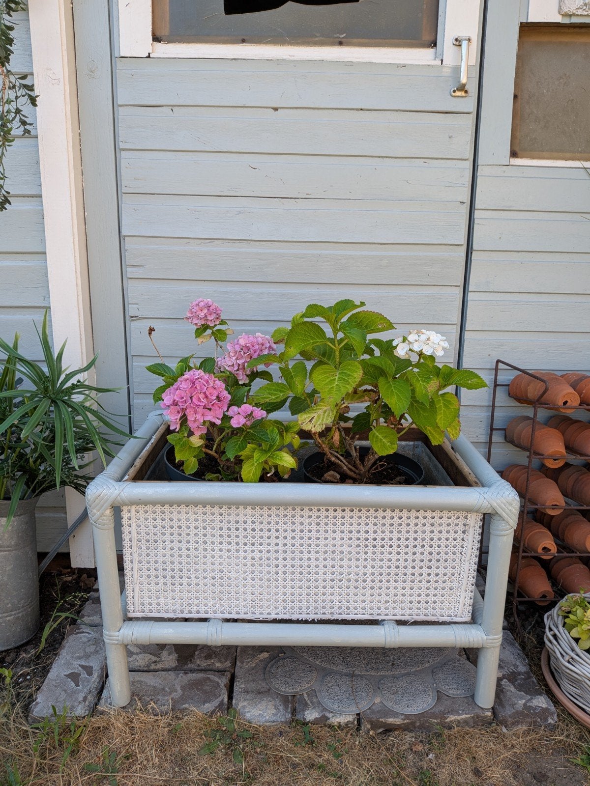 vintage rotan plantenbak met zinken binnenkuip, Tuin en Terras, Ophalen, Binnen
