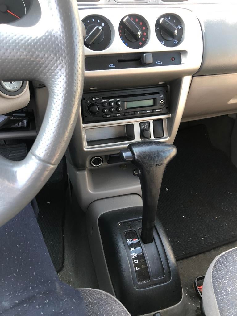 Nissan Micra automaat met keuring, Auto's, Stof, Beige, Micra, 2 deurs