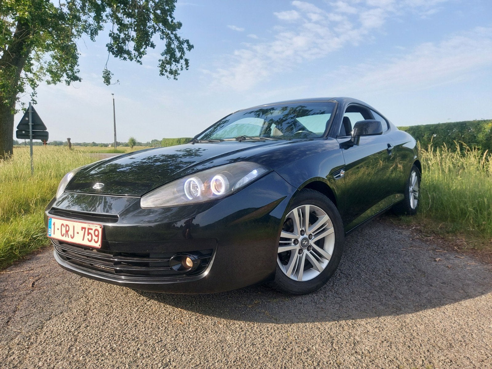 HYUNDAI TIBURON COUPE 2L 143PK BLANCO GEKEURD VOOR VERKOOP !, Auto's, Hyundai, Particulier, Airbags, Centrale vergrendeling, Radio