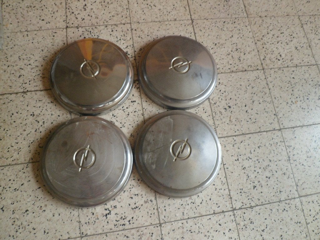 wieldeksels merk opel, Ophalen