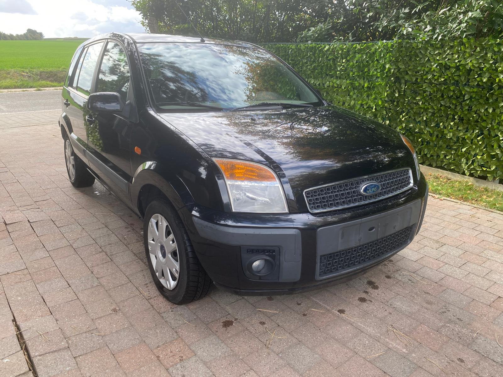Ford Fusion Ghia 2006 1.4 benzine automaat airco, Auto's, Automaat, Stof, Fusion, Multifunctioneel stuurwiel