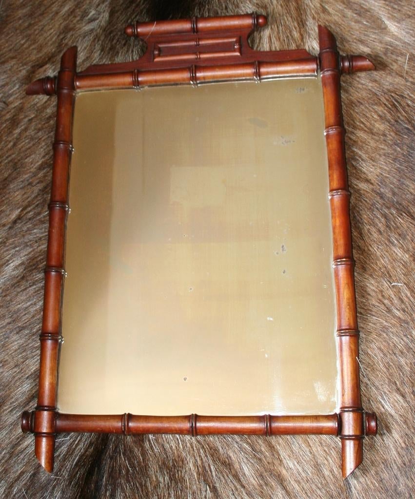 Verweerde spiegel in faux bamboo kader, Antiek en Kunst, Ophalen