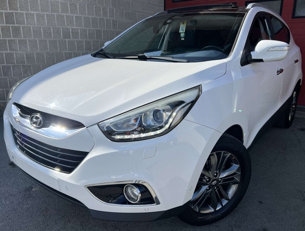 Hyundai ix35 1.6i 2WD Executive +CAR-PASS +CAMÉRA +NAVI +PA, Auto's, Gebruikt, 4 cilinders, Wit, Leder