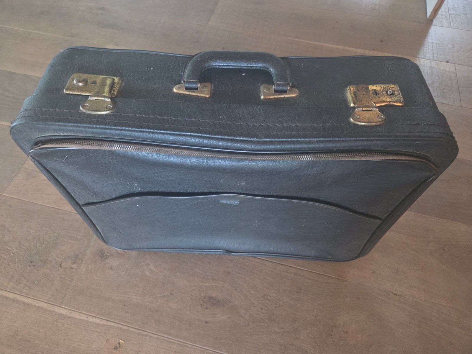 Vintage reiskoffer, Ophalen