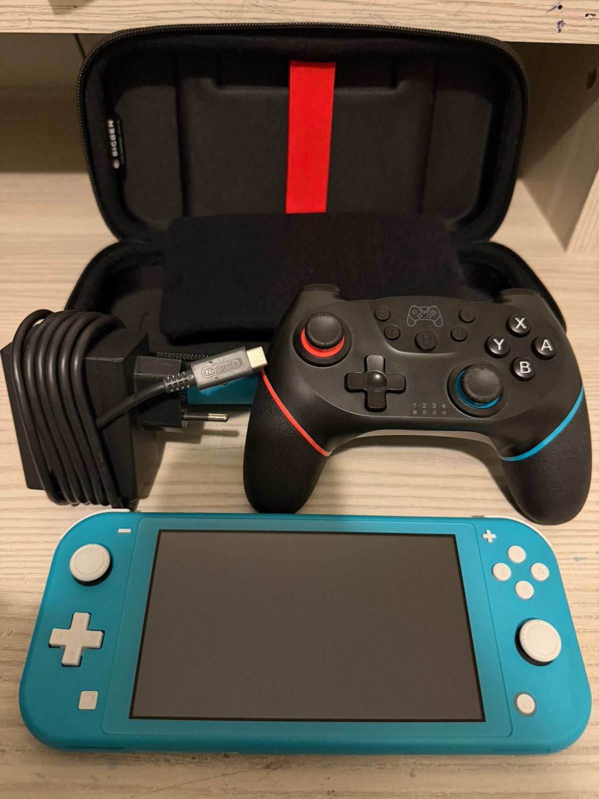 Nintendo Switch Lite + manette + chargeur+ étui de transport, Consoles de jeu & Jeux vidéo, Enlèvement, Turquoise, Comme neuf