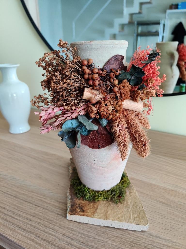 Vaas droogbloemen., Ophalen