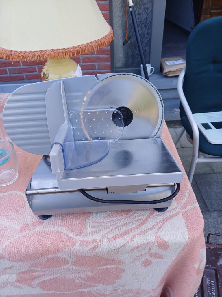 Vlees snijmachine, Ophalen