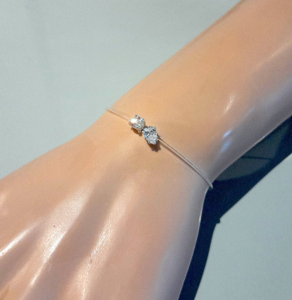Onzichtbare armband met twee diamanten. 0.65ct 925 zilver, Verzenden, Nieuw, Met edelsteen, Zilver