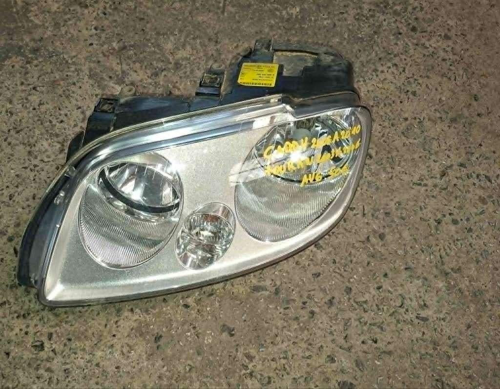 A vendre phare gauche Caddy 2005 à 2010 / Touran 2003 à 2006, Auto-onderdelen, Verlichting, Volkswagen, Gebruikt, Ophalen
