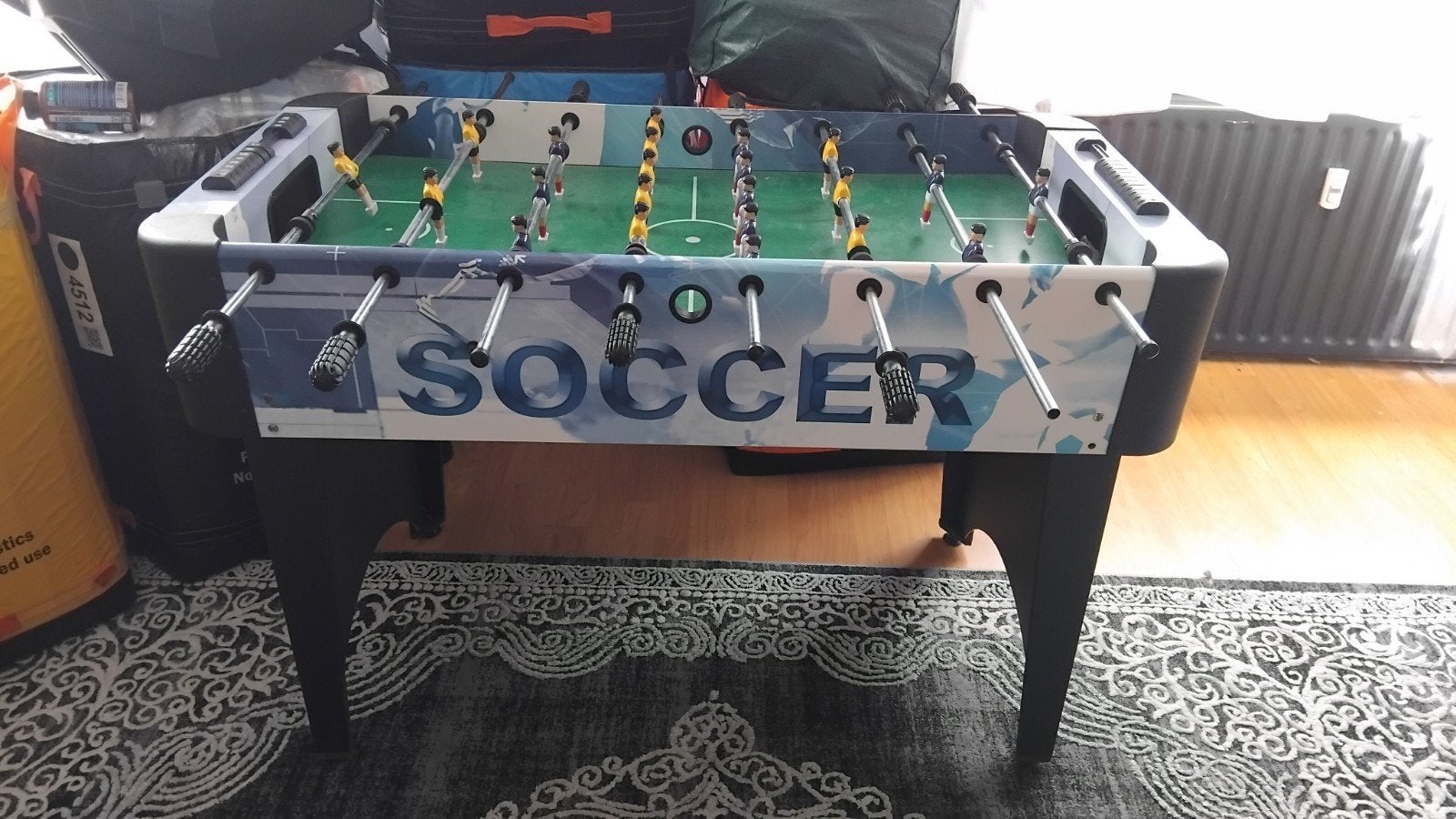 Voetball tafel zonder ball, Ophalen