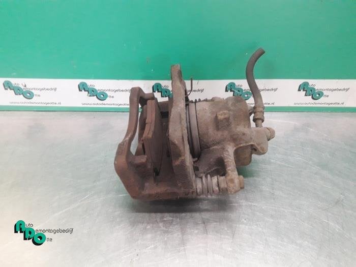 Etrier de frein (pince) avant gauche d'un Suzuki SX-4 (SX-4, -, 3 mois de garantie, Utilisé, -