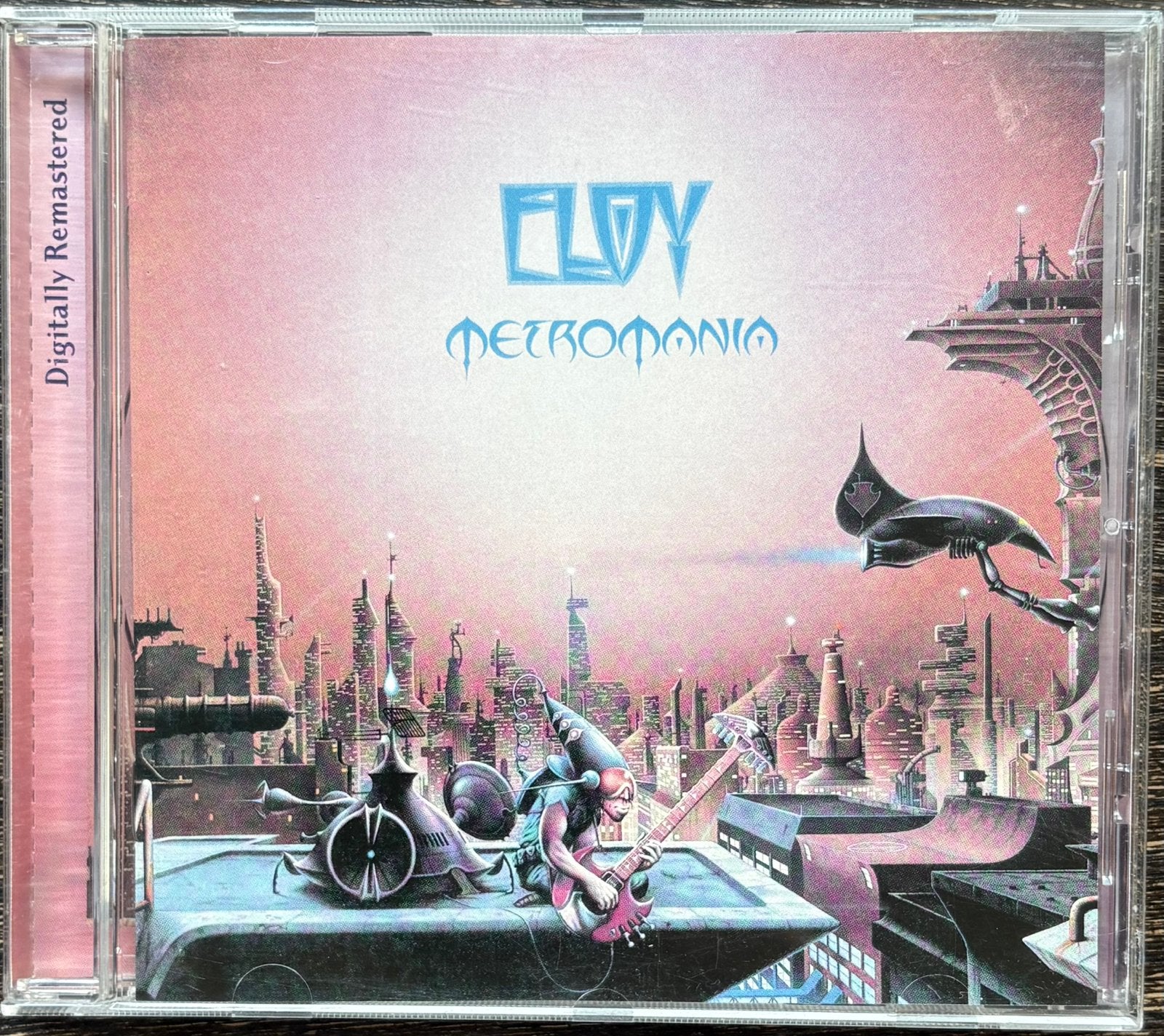 ELOY - Metromania, CD & DVD, CD | Rock, Enlèvement ou Envoi, Comme neuf, Rock progressif