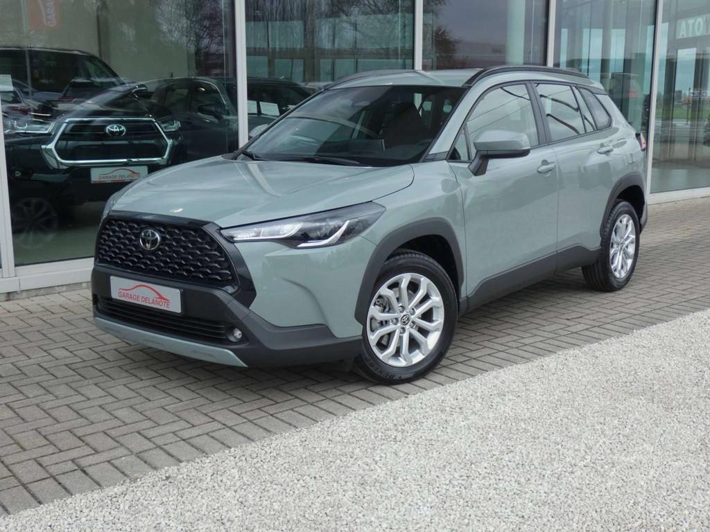 Toyota Corolla Cross 1.8 Hybrid 140PK +Dodehoek +Parkeersens, Auto's, Stof, Gebruikt, Zwart, 4 cilinders