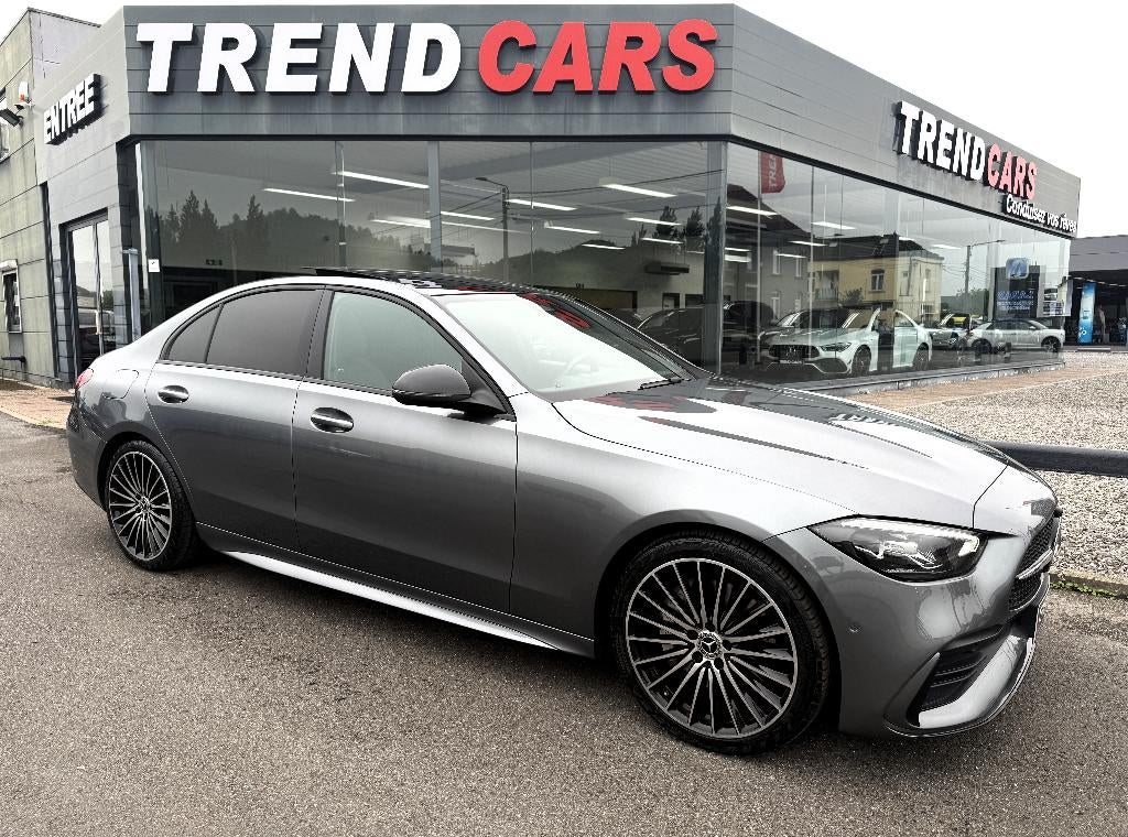 Mercedes C 180 9G-TRONIC PACK AMG/NIGHT PANO CRPLAY LED AMBI, Automaat, Zwart, 4 cilinders, Leder