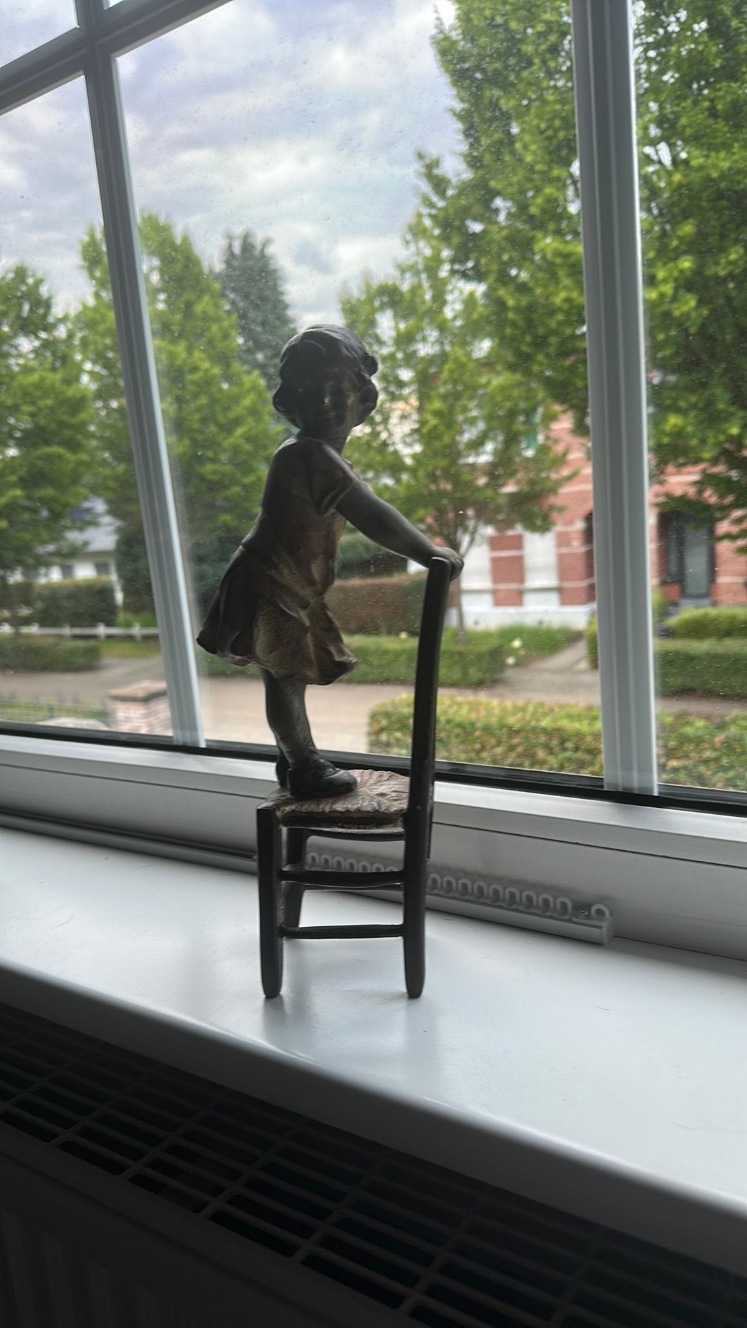 Bronzen beeldje, Ophalen