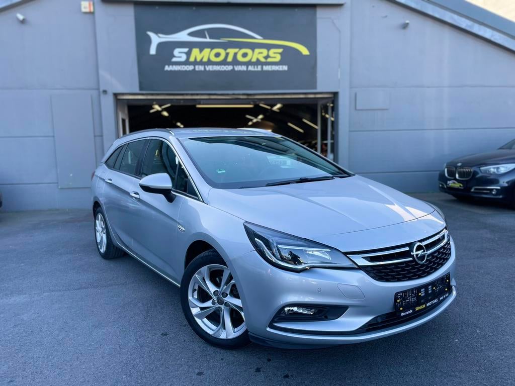 Opel Astra 1.4 benzine | Airco | Gps | Cruise | GARANTIE |, Auto's, Stof, Bedrijf, 5 deurs, 117 g/km