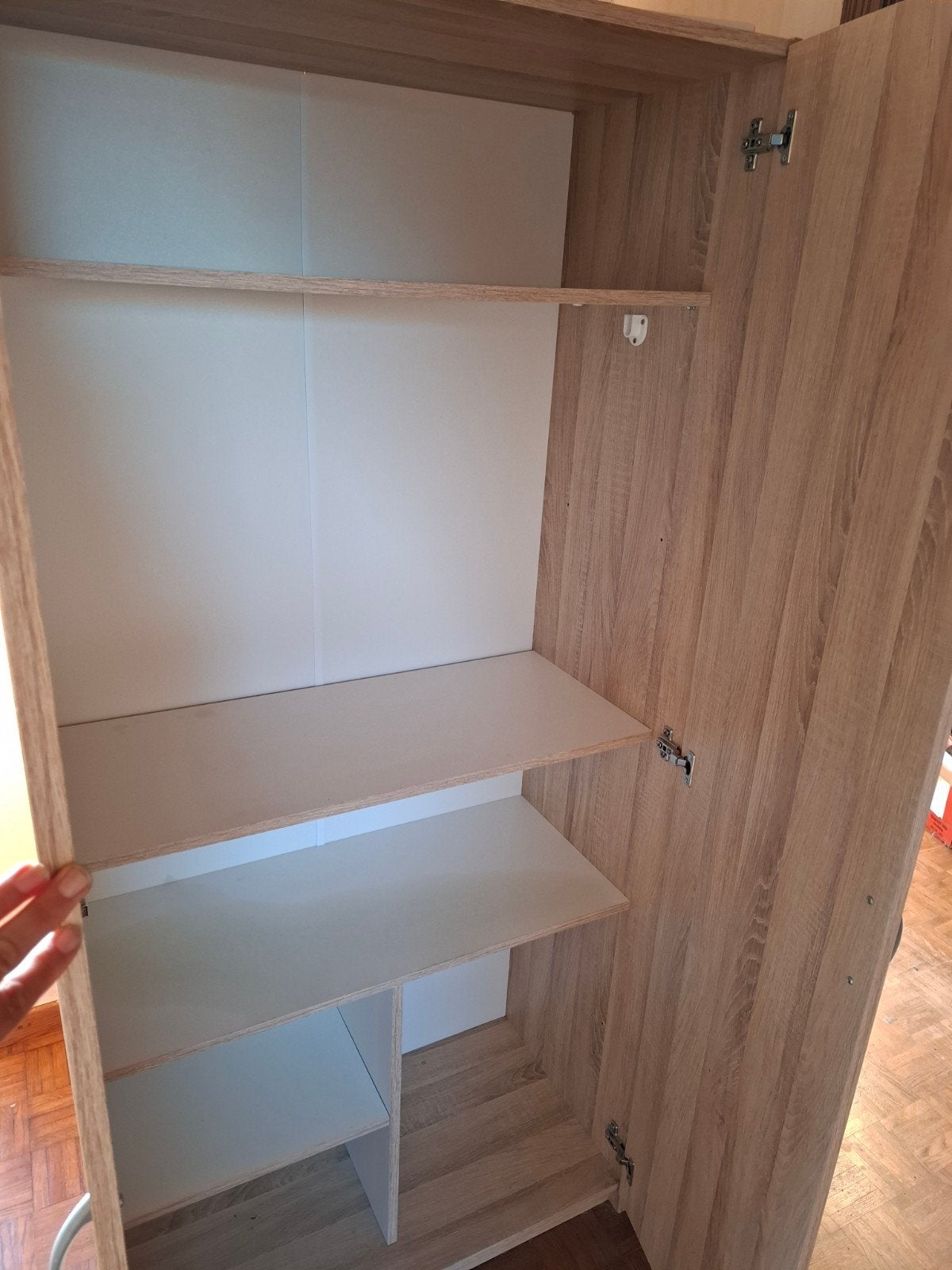 kast kleerkast, Ophalen