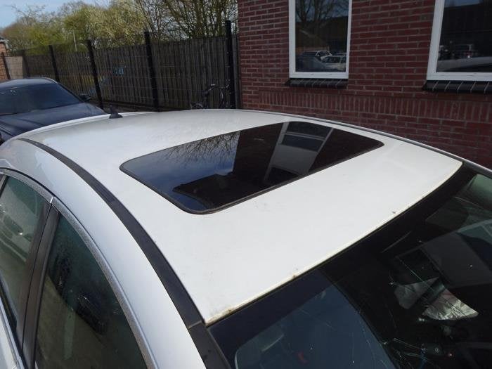 Toit ouvrant d'un Opel Astra, -, Opel, 3 mois de garantie, Utilisé
