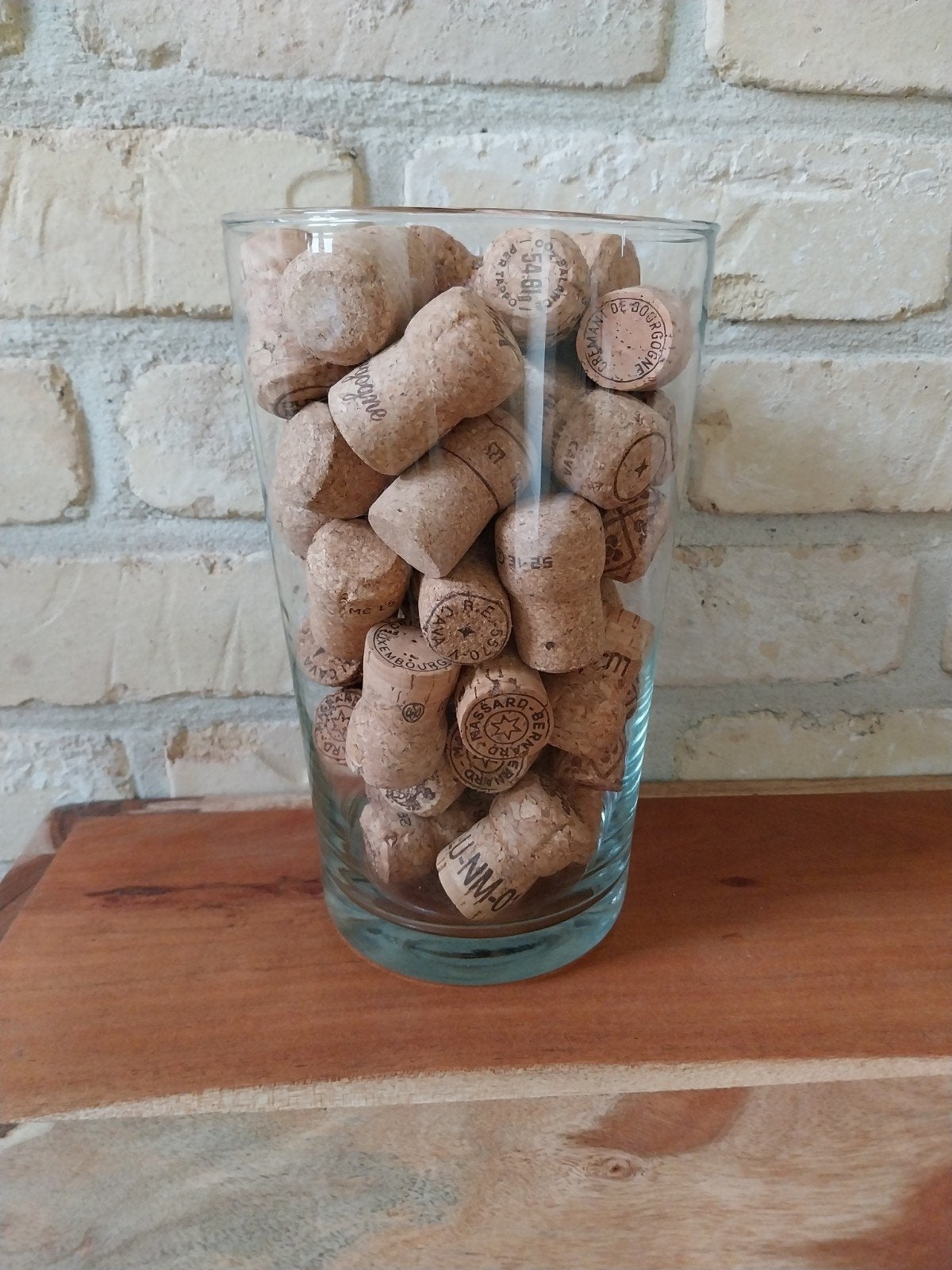 Glazen vaas met cava,champagne kurken, Enlèvement