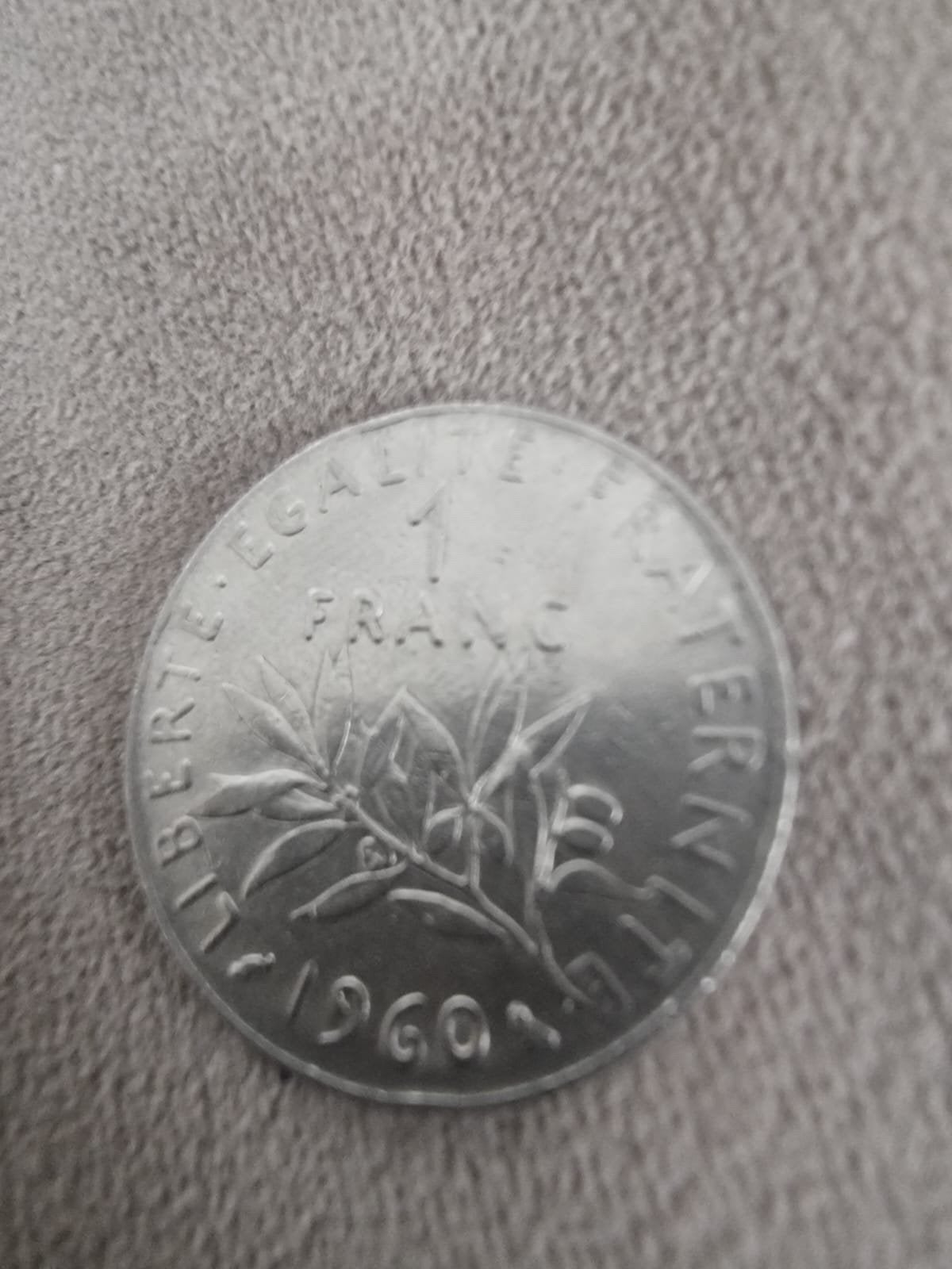 1 munt van Franse frank met het detail van de grote nul, Postzegels en Munten, Ophalen