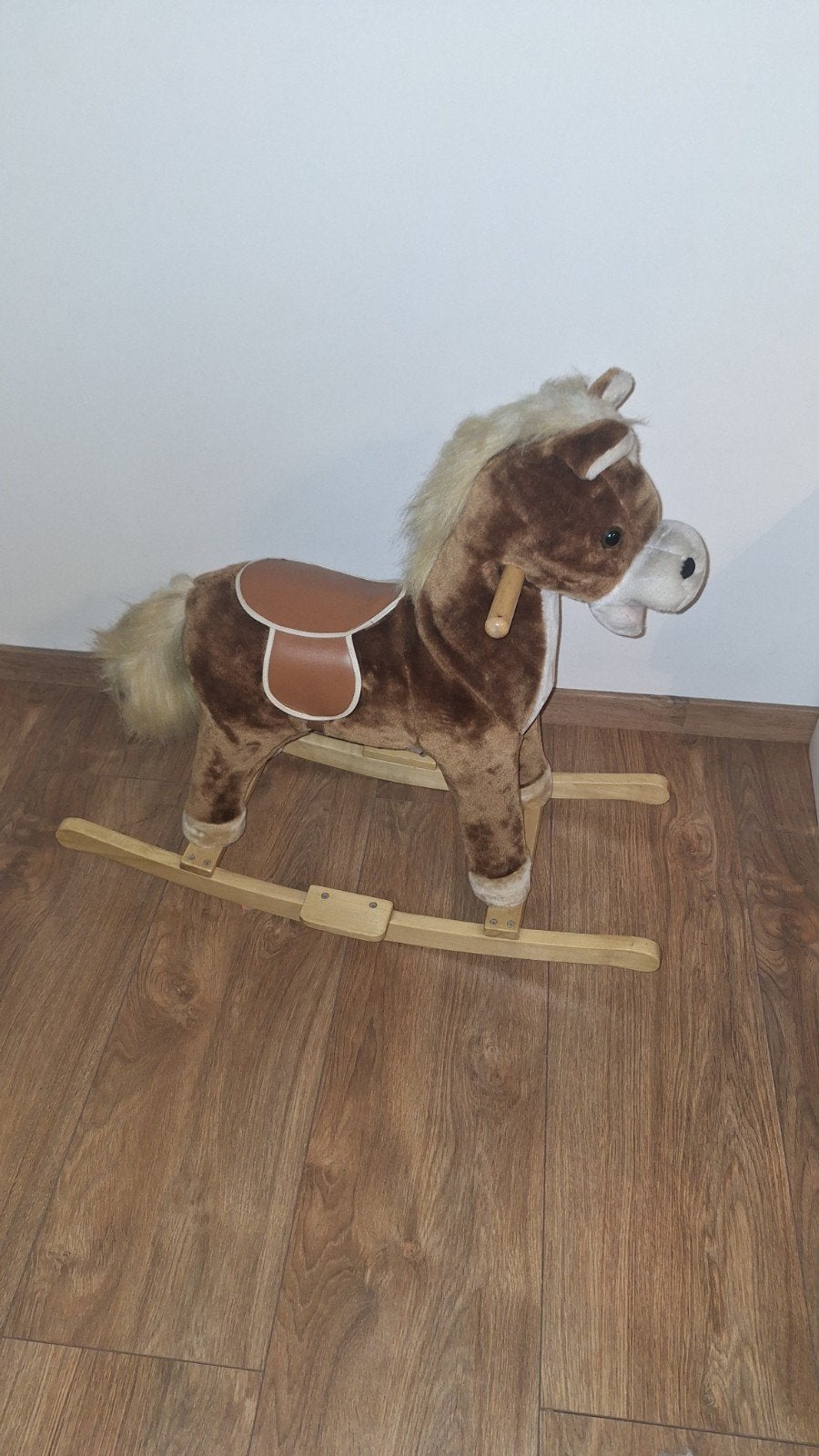 cheval à bascule, Enlèvement ou Envoi