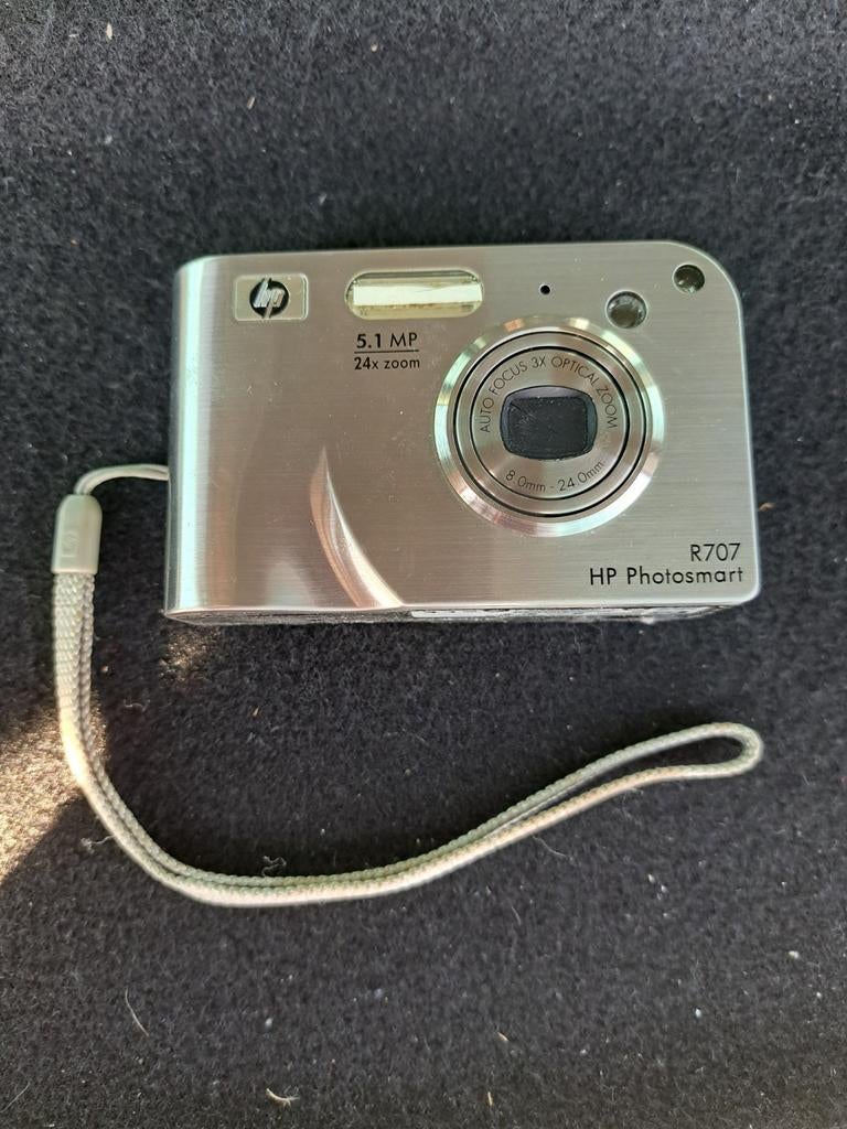 HP photosmart R707+R dock-serie camera fclsd0401, Ophalen of Verzenden, Zo goed als nieuw