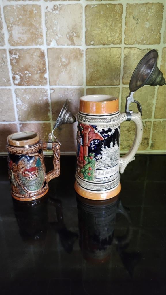 Mancave: set van 2 Barbotine bierpullen met tinnen deksel, Ophalen
