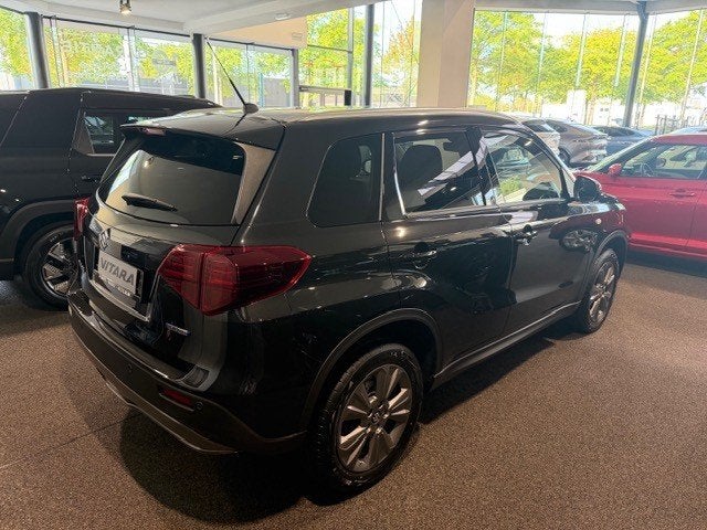 Suzuki Vitara 1.4 Turbo Boosterjet Hyb GL+ *Daginschrijving*, Auto's, Suzuki, Voorwielaandrijving, Stof, 4 cilinders, Zwart