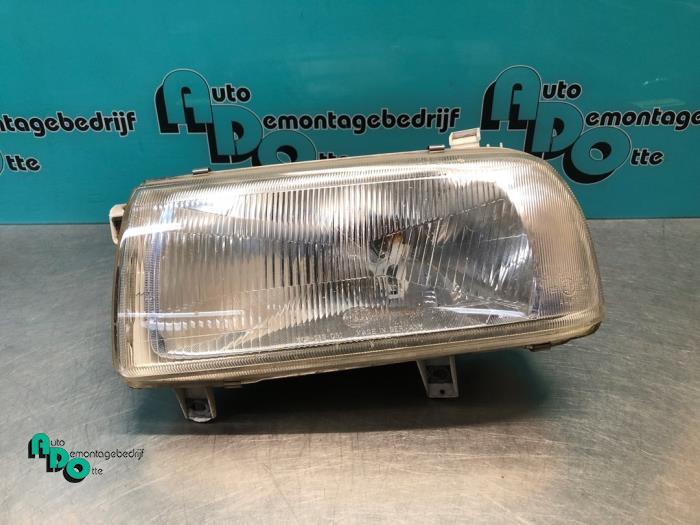 Phare gauche d'un Volkswagen Vento (Vento 91-), Volkswagen, -, 3 mois de garantie, Utilisé
