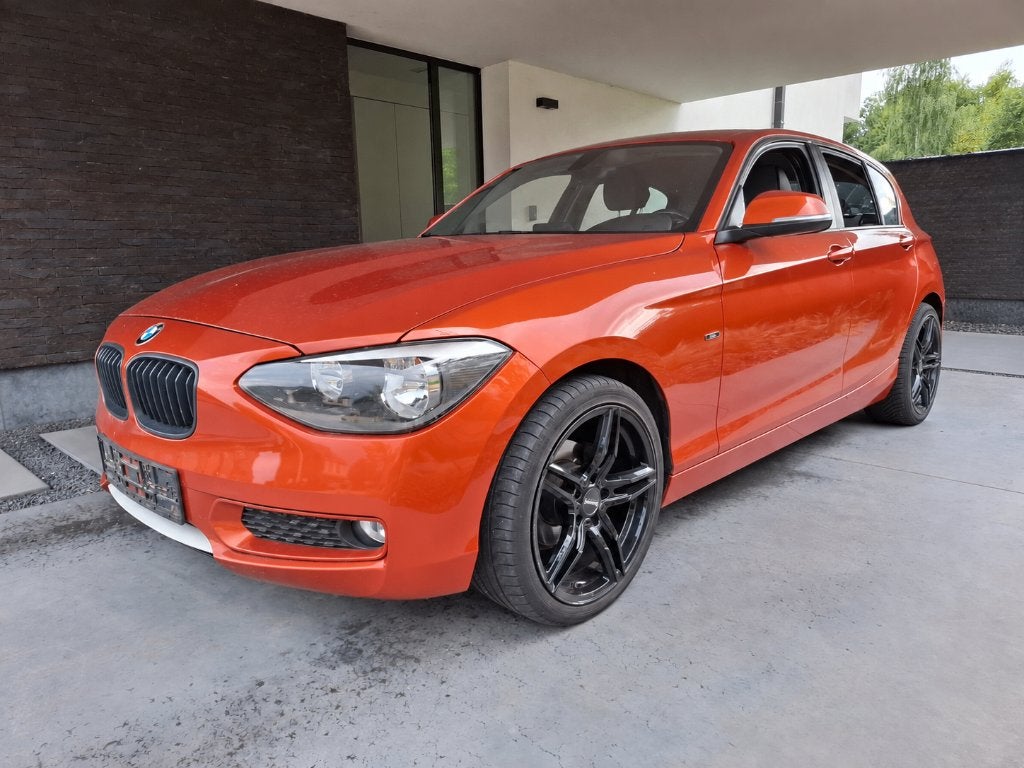BMW 116i F20 Urban uit 2012, Auto's, 100 kW, Euro 5, Leder en Stof, Parkeersensor
