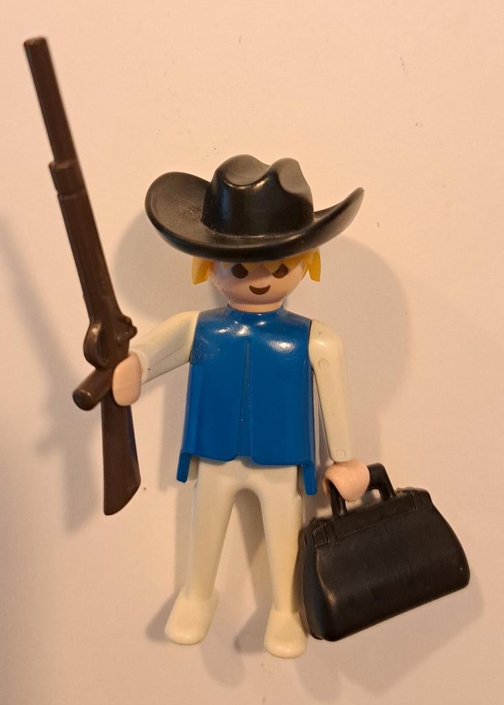Dit speelfiguur is een Playmobil Western boef, die qua uiter, Games en Spelcomputers, Ophalen