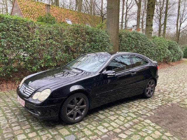 Mercedes C 180 Coupe, Auto's, Achterwielaandrijving, Zwart, 4 cilinders, Verwarmde buitenspiegels