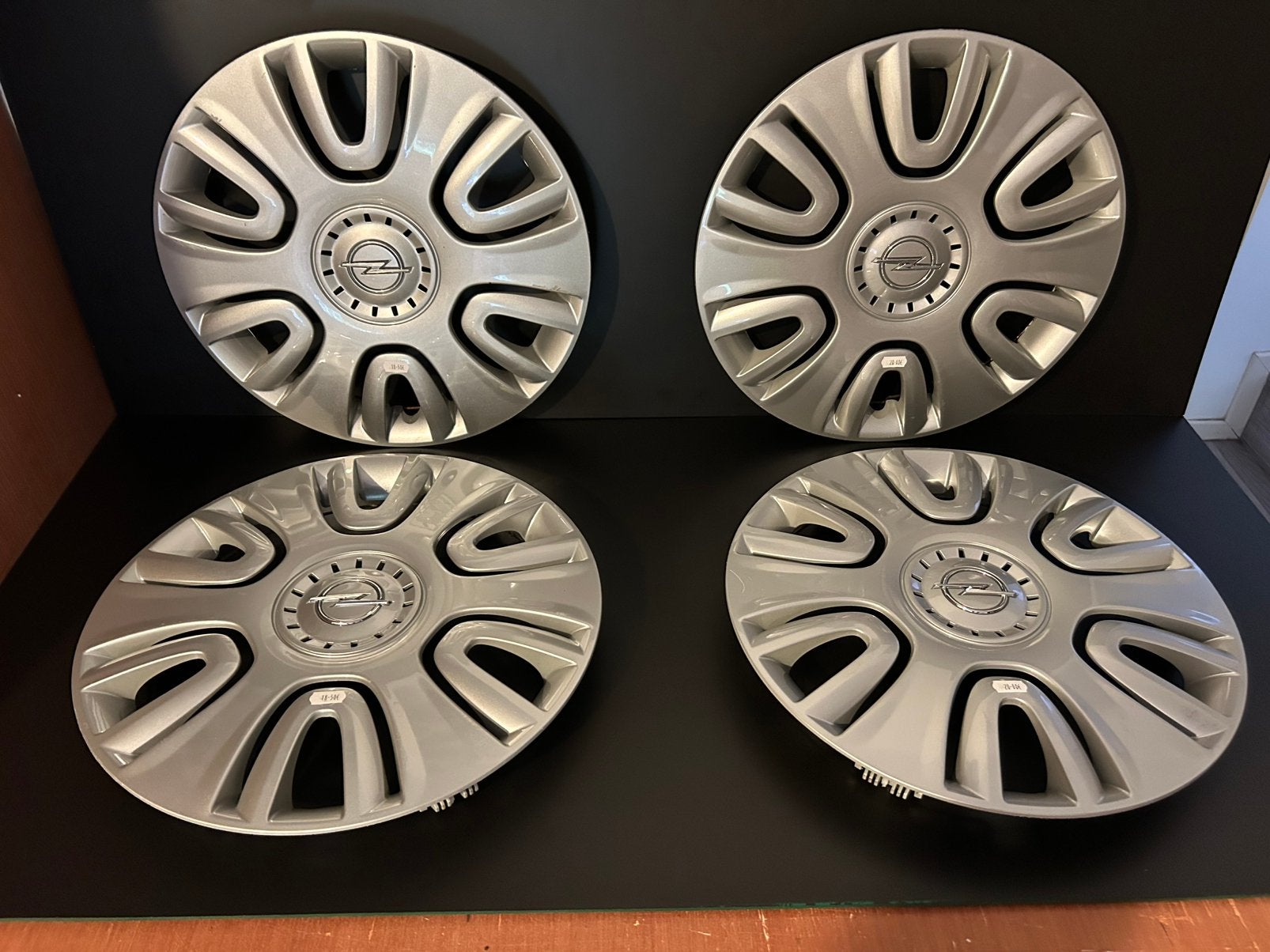 4 originele Opel Agila corsa combo 15" wieldoppen, Auto diversen, Wieldoppen, Zo goed als nieuw, Ophalen of Verzenden