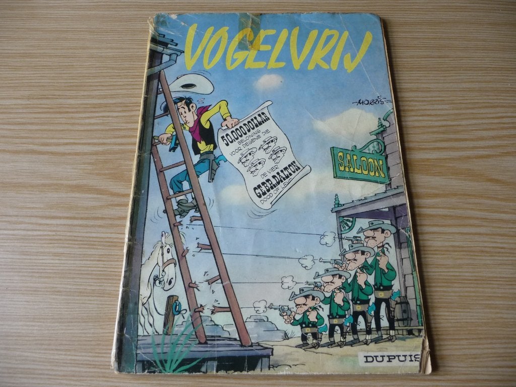 Lucky Luke 6. Vogelvrij 1964 €2, Gelezen, Eén stripboek, Ophalen of Verzenden, Morris